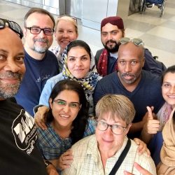 Group selfie of NCCU faculty hosts and Pakistani fellows