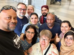 Group selfie of NCCU faculty hosts and Pakistani fellows